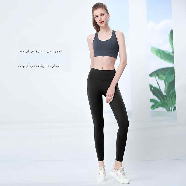 High waist belly tuck yoga pants for women with skinny fit and breathable fabric.