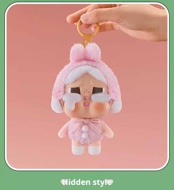 POP MART Crybaby hidden style doll in pink rabbit outfit with keychain attachment.