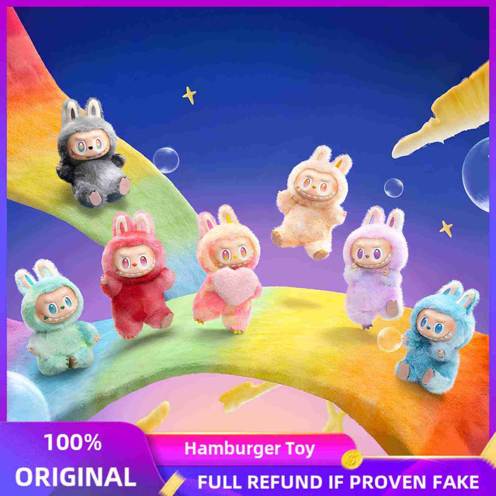 Pop Mart THE MONSTERS plush toys in colorful bunny outfits on a rainbow backdrop, from the Front High Energy Series.