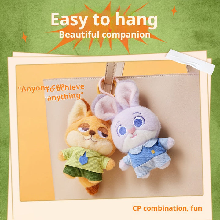 Zootopia plush keychains featuring Nick and Judy, MINISO Disney collection, soft material, perfect for bags or keys.