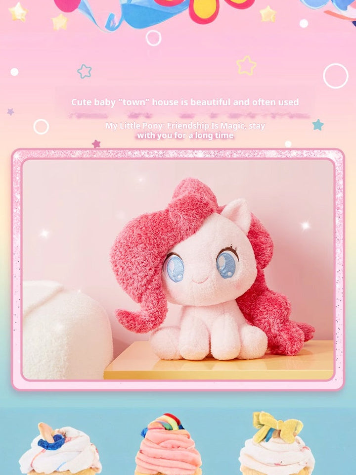 Plush My Little Pony toy in a cute sitting position with pink mane and sparkling eyes, ideal for decoration or cuddling.