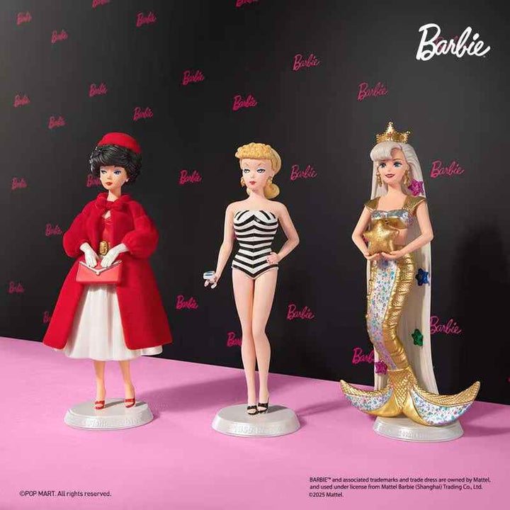 POPMART Barbie Fashion Series collectible figures from blind box set, featuring Barbie in iconic outfits like striped swimsuit, red dress, and mermaid costume.
