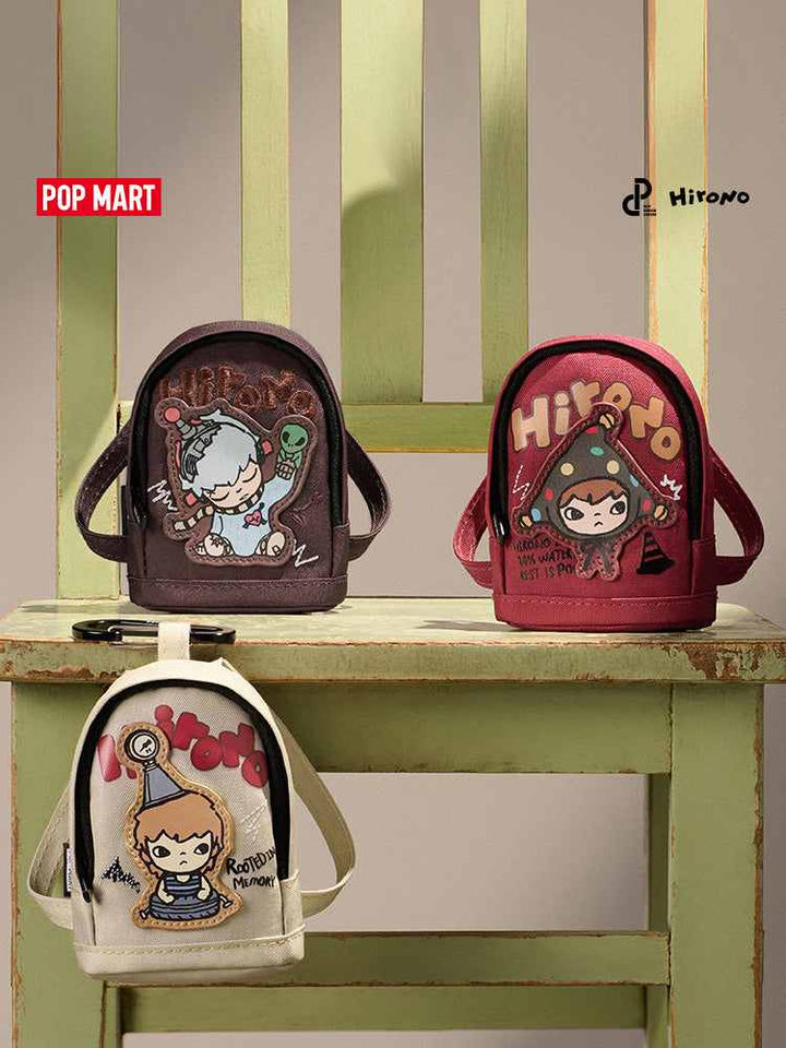 POPMART شنطة صغيرة بتصميم شخصيات Hirono اللطيفة من Pop Mart، مثالية للشنطة أو الرقبة.