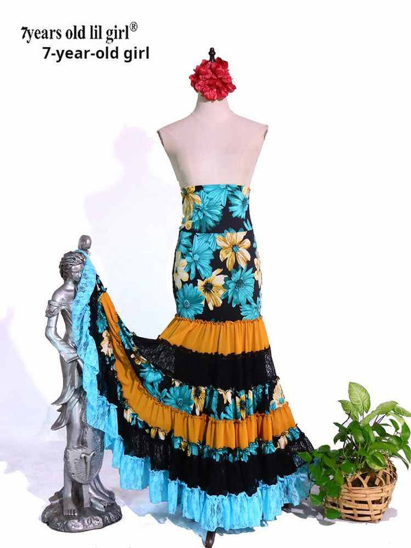 Colorful floral girls' flamenco skirt with layered ruffles and lace trim.