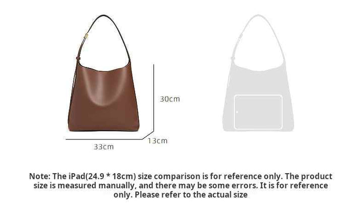 Brown CHARLES & KEITH shoulder bag with wide adjustable strap and magnetic closure, 33x13x30 cm size, suitable for daily essentials and small tablets.