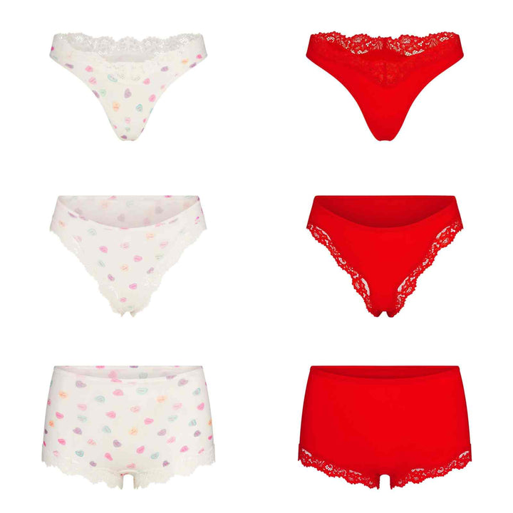SKIMS FITS EVERYBODY lace dipped thong and brief lingerie set in classic red and printed white with soft breathable polyamide and delicate lace trim.