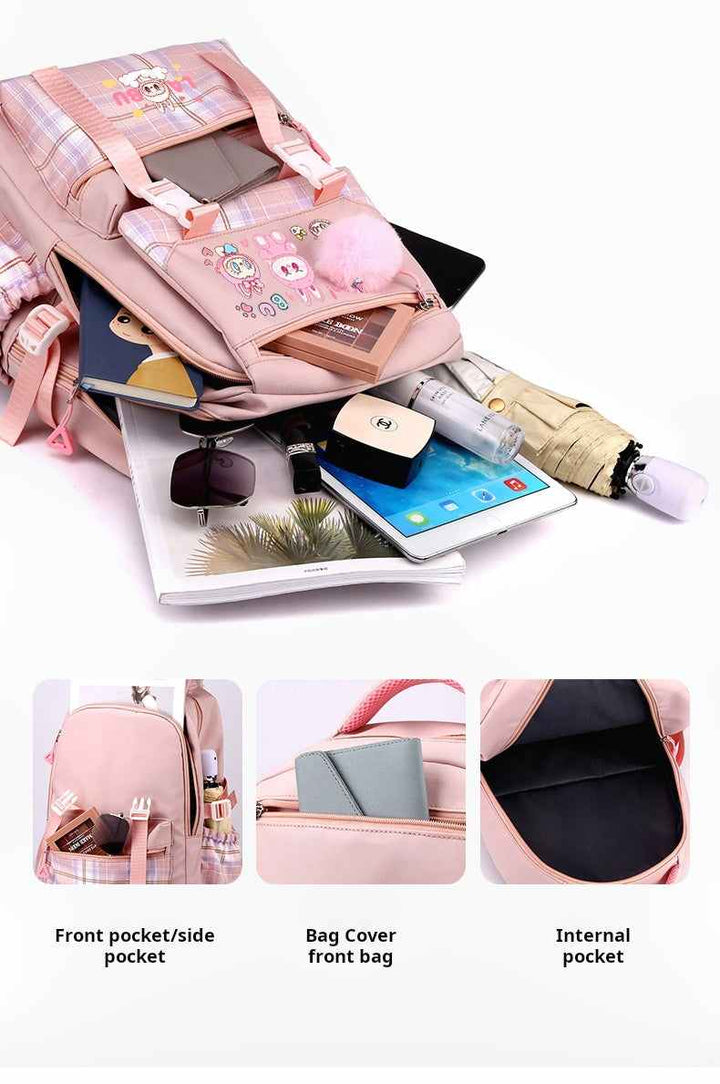 Pink LABUBU backpack with cartoon design, large capacity, multiple pockets, and included school supplies gift set.