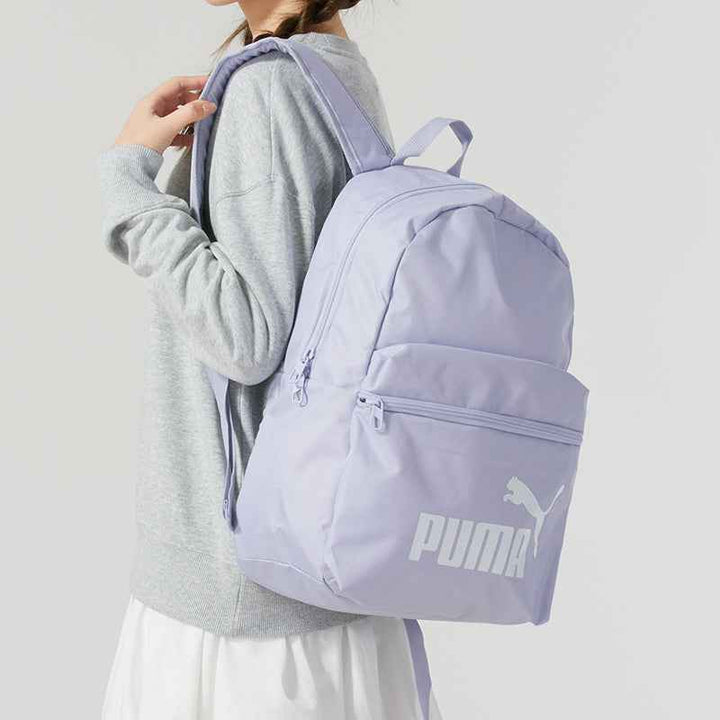 Purple PUMA backpack with spacious main compartment and front zip pocket, durable and lightweight for school and daily use