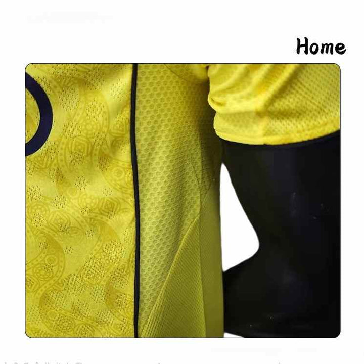 Close-up of the yellow Nassr Riyadh 1955 football jersey with black details and breathable fabric, Player Edition design.