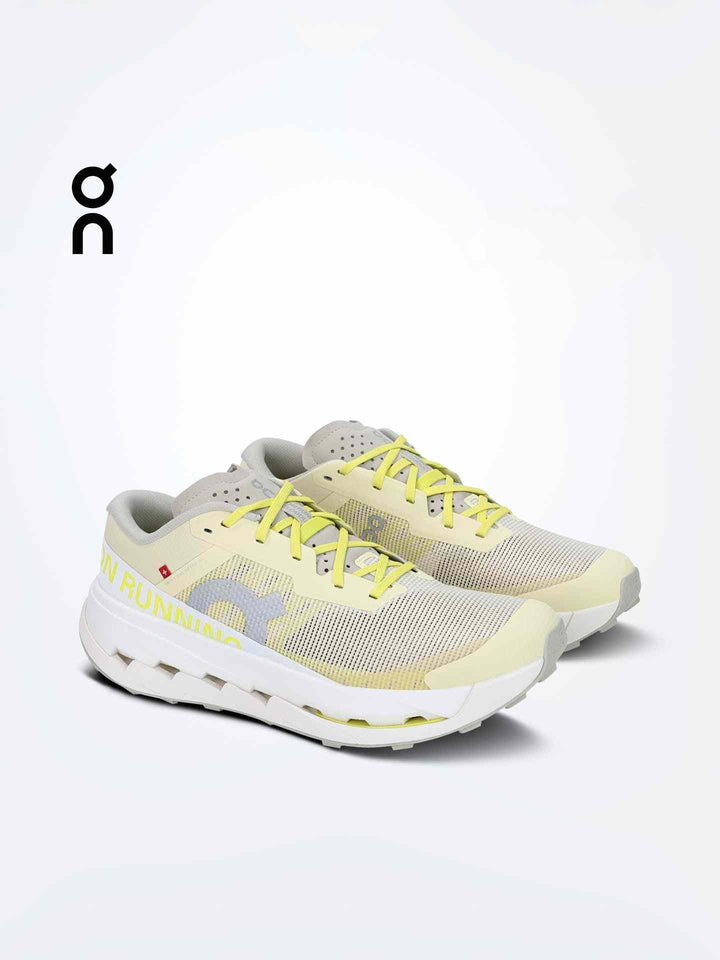 OnRunning Cloudultra men's long-distance trail running shoes in beige with yellow accents and white sole