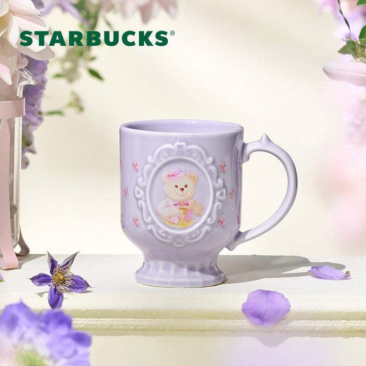 كوب ستاربكس بنفسجي بتصميم أنيق وزخارف زخرفية مع قبضة مريحة مثالي للمشروبات الساخنة والباردة