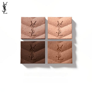 لقطة قريبة لأربع درجات بنية ونحاسية دافئة بنقش بارز في باليت ظلال عيون بشعار YSL