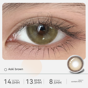 Aoki Brown colored contact lenses by Tinacon featuring a light greenish-brown blend with an 8.5mm base curve.