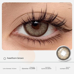 Heartburn Brown color of Tinacon Korean contact lenses offering a soft rimless design for enhanced eye depth.