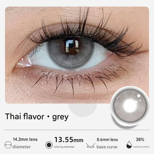 Close up look at Thai Flavor Grey colored contact lenses by Tinacon with a 13.55mm coloring diameter.