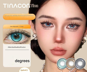 A beauty shot of a model wearing Tinacon Tsutsumi series blue lenses, showcasing the dramatic eye-enlarging effect and premium quality.