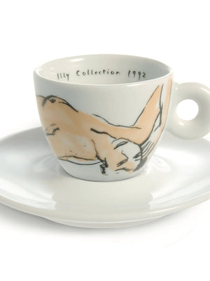 فنجان illy إصدار 1992 بتصميم رسم تخطيطي لشخص مع صحنه